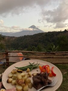 A dinner plate with Agua volcano in the background 