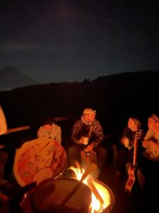 Sitting around the campfire at night