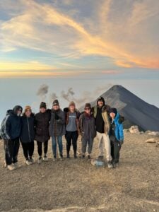 Group photo in front of Fuego volcano 