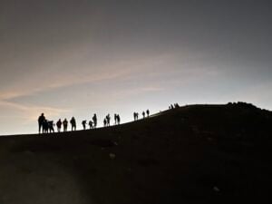 Silhouettes of hikers